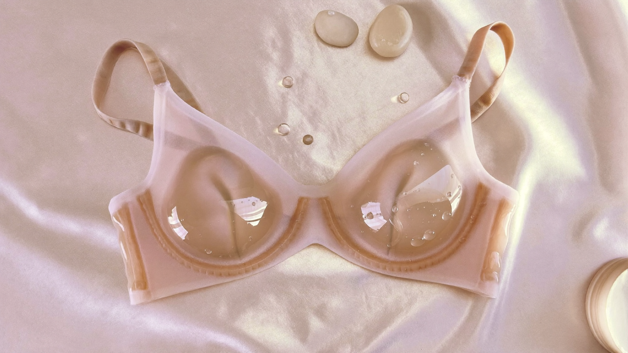 Soft translucent jelly-texture bra in blush tone on pastel satin