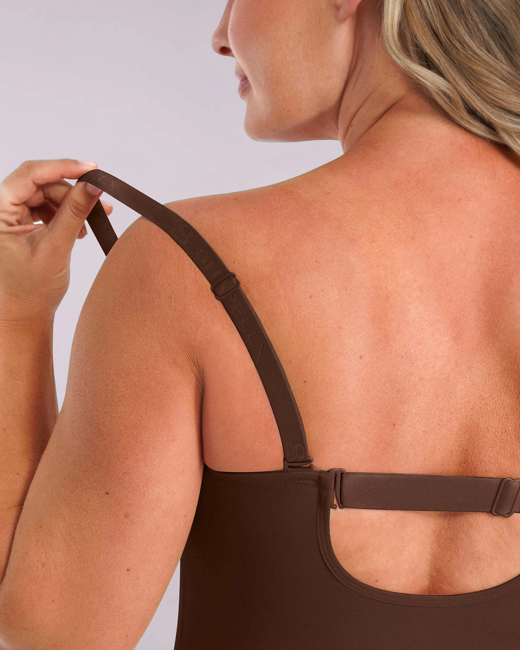 PureForm AeroSlim Strapless Thong Bodysuit — CoreFlex™